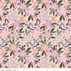 Juju's Petals Floral Pink quilting fabric shown with a ruler for scale, featuring colorful flowers, butterflies, and olive green leaves on a soft pink background.