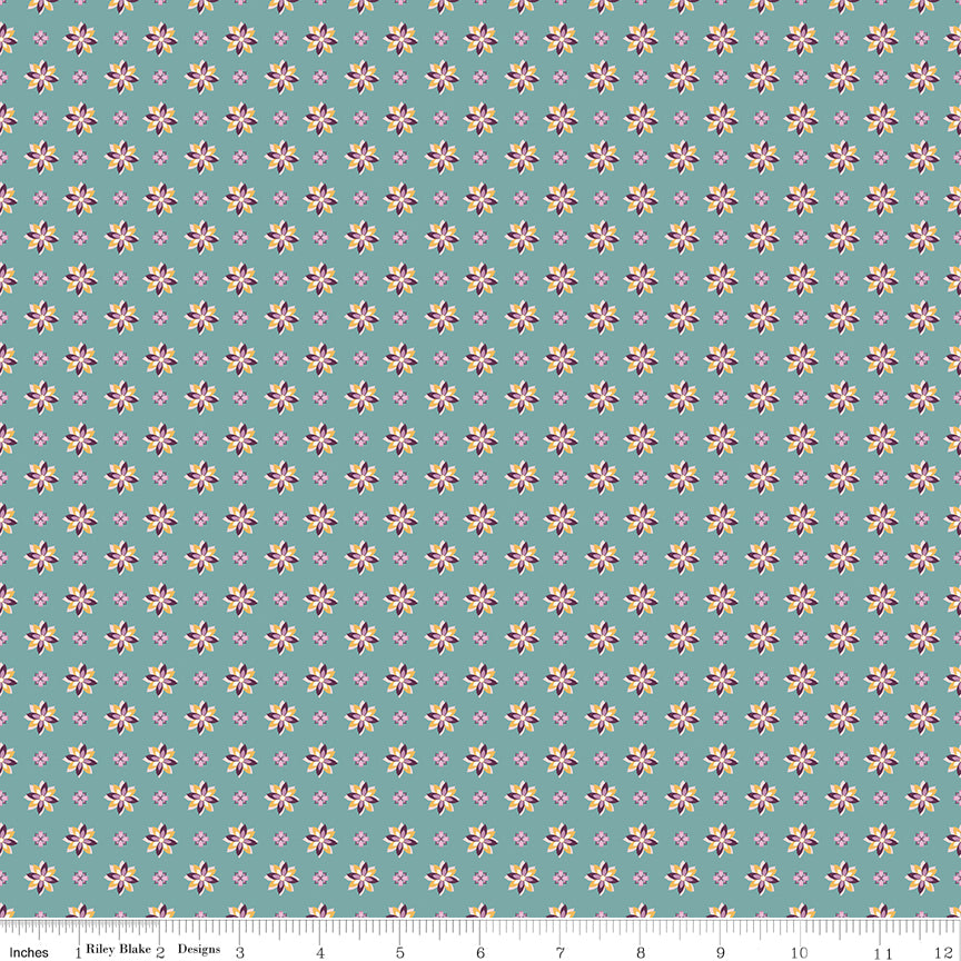 Juju's Petals Calico Teal floral quilting fabric shown with a ruler for scale, featuring rows of colorful small flowers on a teal background.