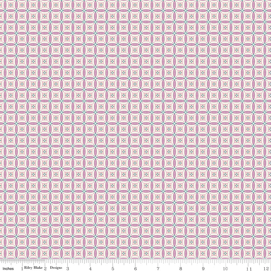 Juju's Petals Mosaic Lilac fabric shown with a ruler for scale, featuring small repeating diamond and petal-shaped mosaic motifs.