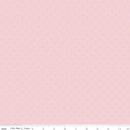 Juju's Petals Lattice Pink fabric shown with a ruler for scale, featuring a delicate small-scale pink lattice-inspired pattern.
