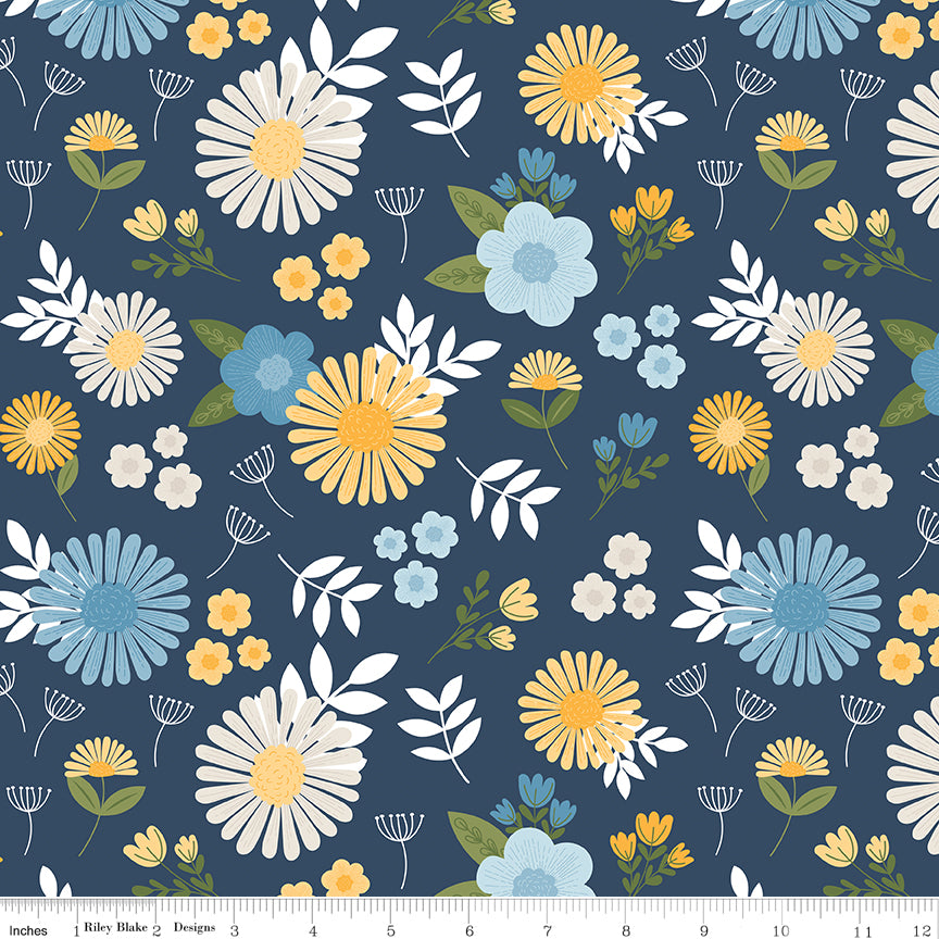 Sunshine & Dandelions Main Navy floral quilting cotton by Traci Reed for Riley Blake Designs shown with ruler for print scale