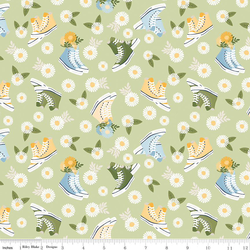 Sunshine & Dandelions Shoes Honeydew quilting cotton by Traci Reed for Riley Blake Designs shown with ruler for print scale
