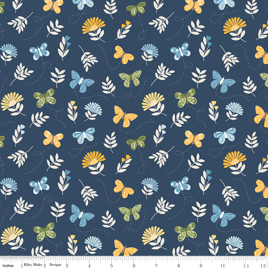 Sunshine & Dandelions Butterflies Navy quilting cotton by Traci Reed for Riley Blake Designs shown with ruler for print scale
