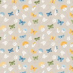 Sunshine & Dandelions Butterflies Sand fabric by Traci Reed featuring colorful butterflies, flowers and leaves on a soft sand background