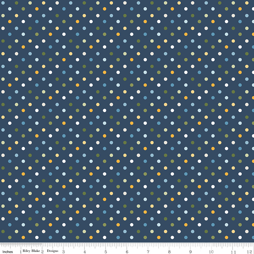 Sunshine & Dandelions Dots Navy quilting cotton by Traci Reed for Riley Blake Designs shown with ruler for print scale