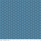 Sunshine & Dandelions Hexies Blue quilting cotton by Traci Reed for Riley Blake Designs shown with scale ruler