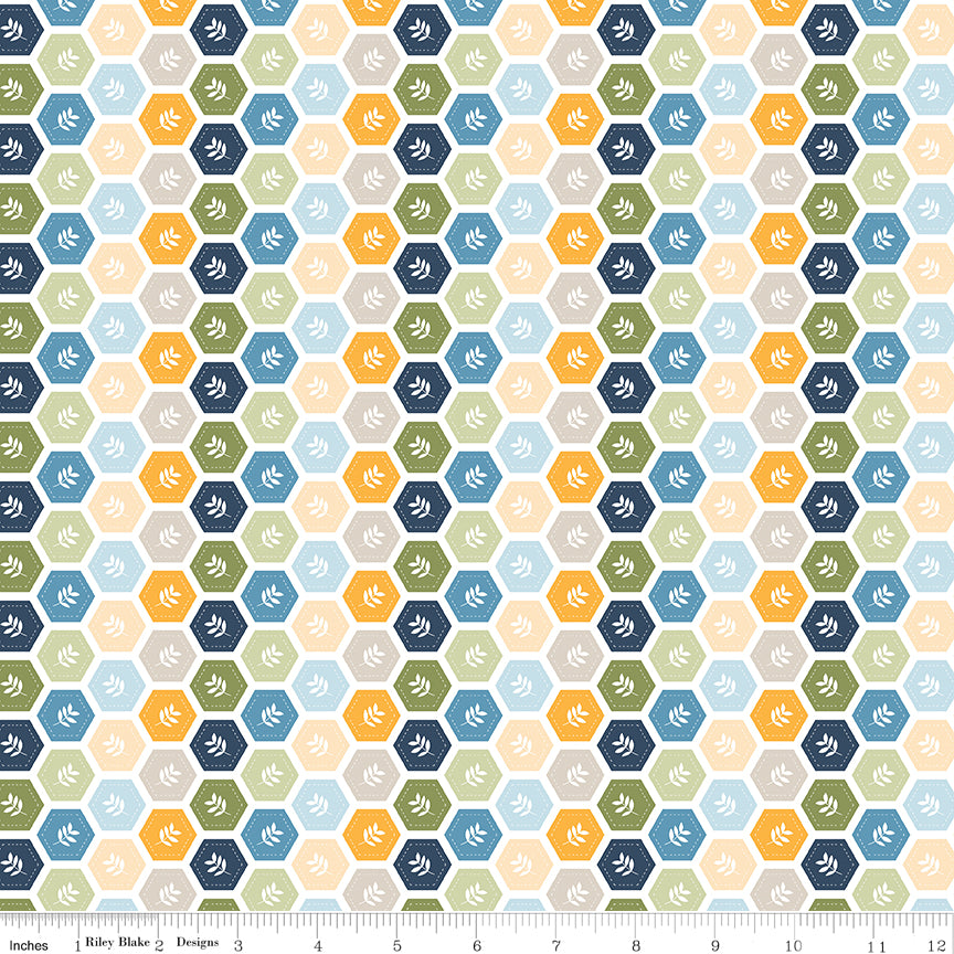 Sunshine & Dandelions Hexies Multi quilting cotton by Traci Reed for Riley Blake Designs shown with ruler for print scale