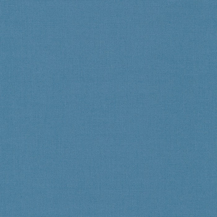 Kona Cotton Delft Blue muted medium blue solid quilting fabric by Robert Kaufman Fabrics.