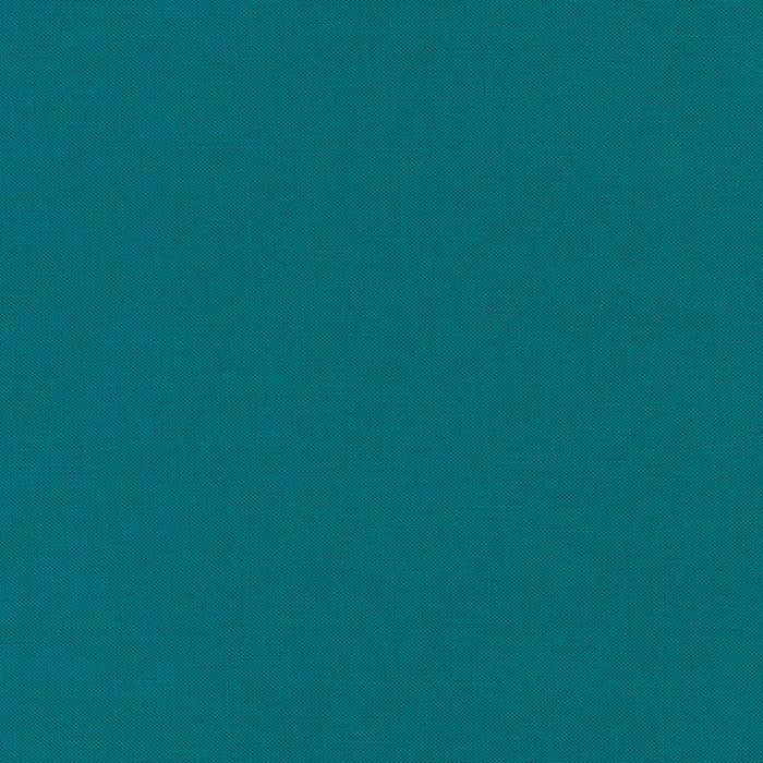 Kona Cotton Glacier Blue deep teal blue solid quilting fabric by Robert Kaufman Fabrics.