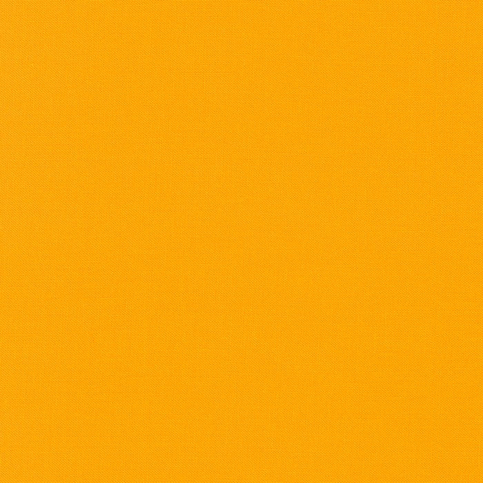 Kona Cotton Papaya golden yellow orange solid quilting fabric by Robert Kaufman Fabrics.